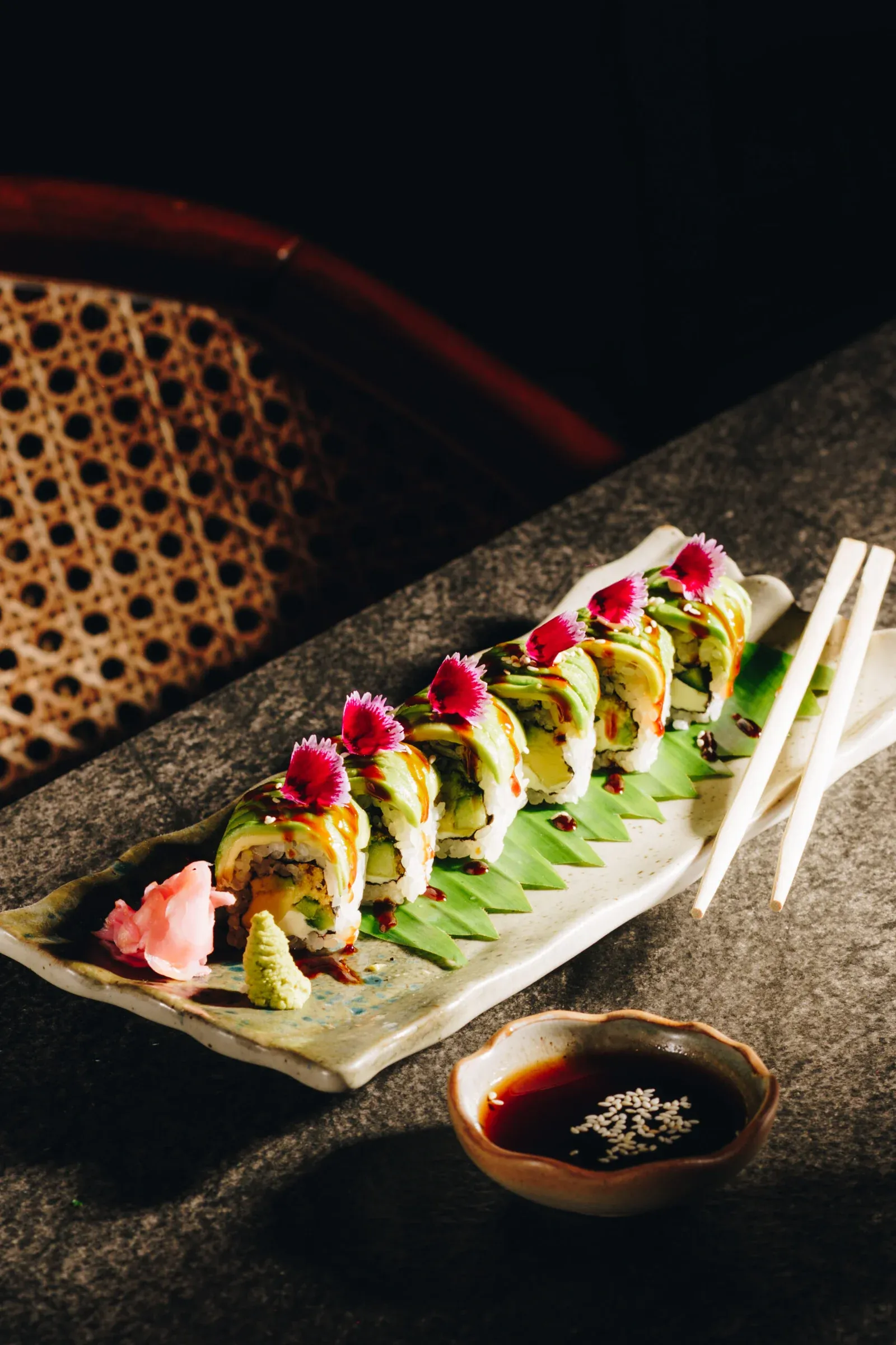 Sushi rolls topped with avocado at Purple Basil rooftop